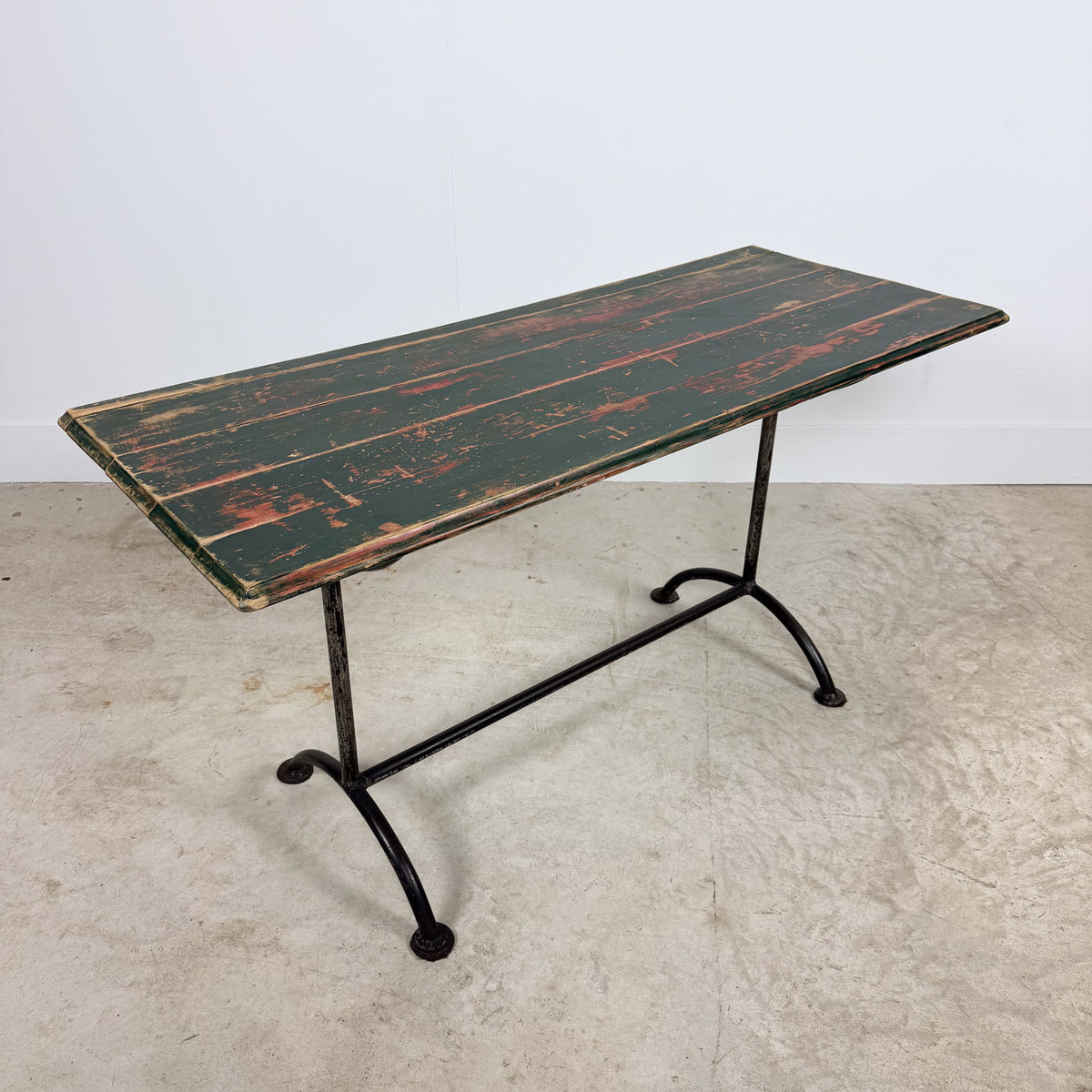 Vintage industrial bistro table with green painted wooden top