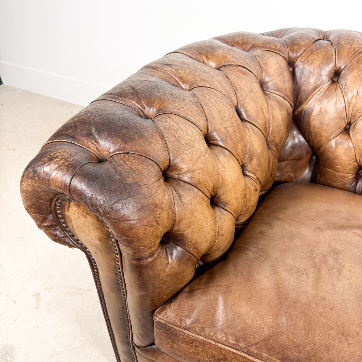 Vintage brown leather chesterfield two seater sofa