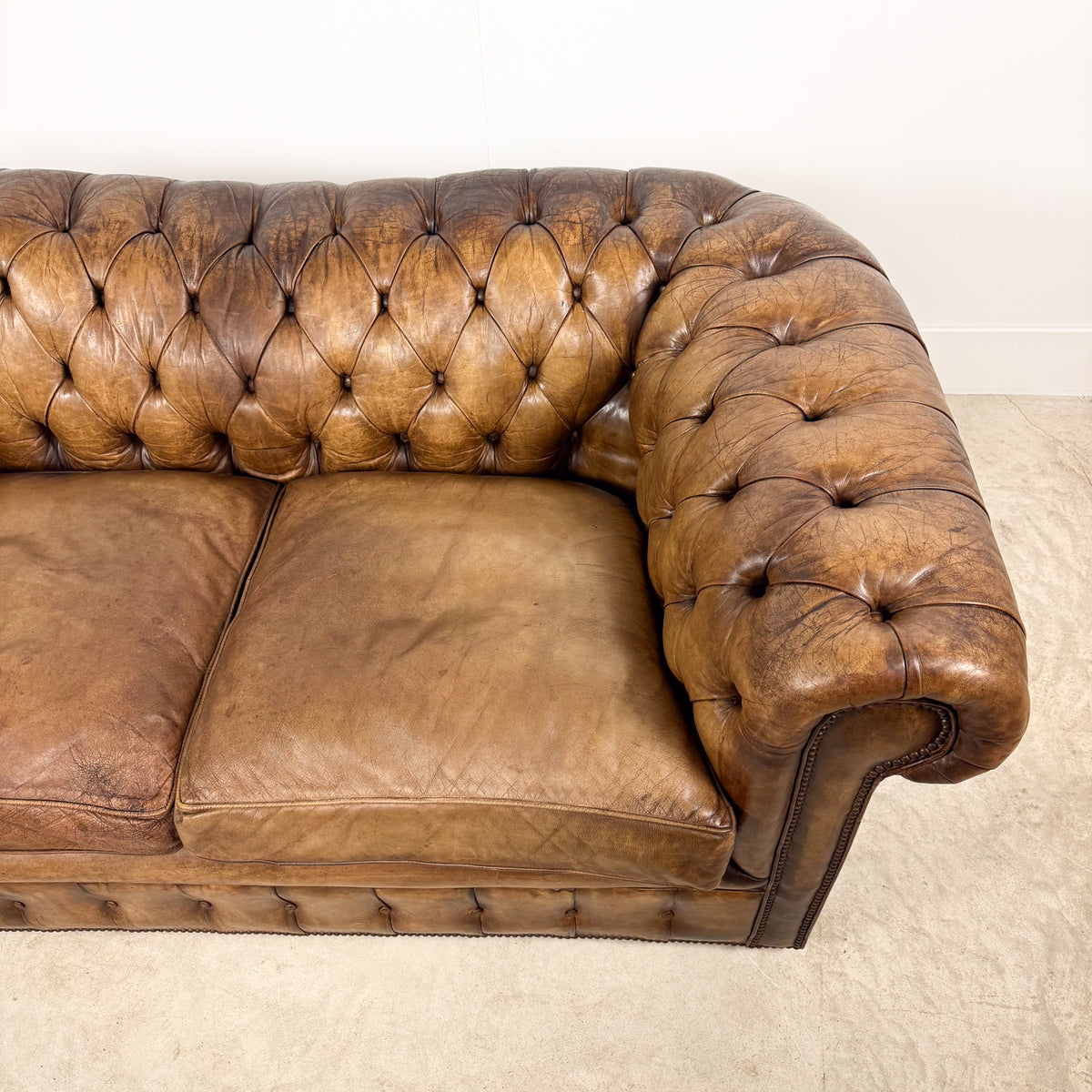 Vintage brown leather chesterfield two seater sofa