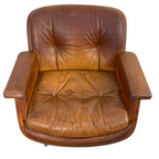 Pair of vintage cognac leather swivel lounge chairs by Eugen Schmidt