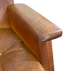 Pair of vintage cognac leather swivel lounge chairs by Eugen Schmidt
