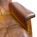 Pair of vintage cognac leather swivel lounge chairs by Eugen Schmidt