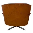 Pair of vintage cognac leather swivel lounge chairs by Eugen Schmidt