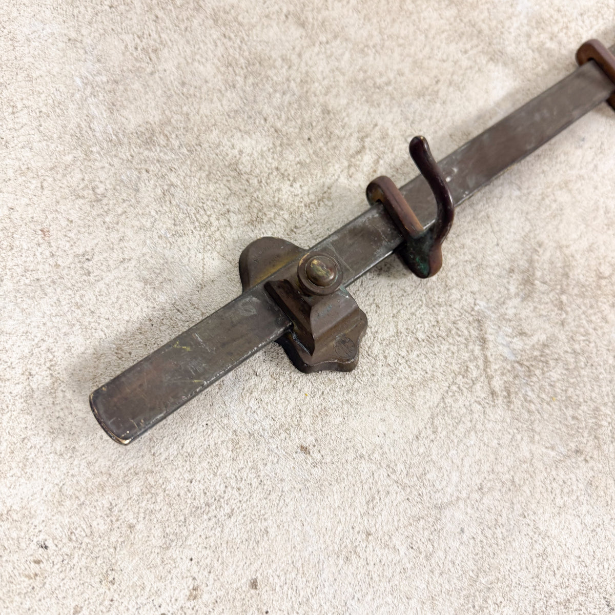 Antique industrial kitchen pot rack in copper with adjustable hooks