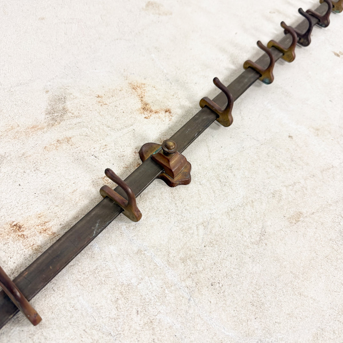 Antique industrial kitchen pot rack in copper with adjustable hooks