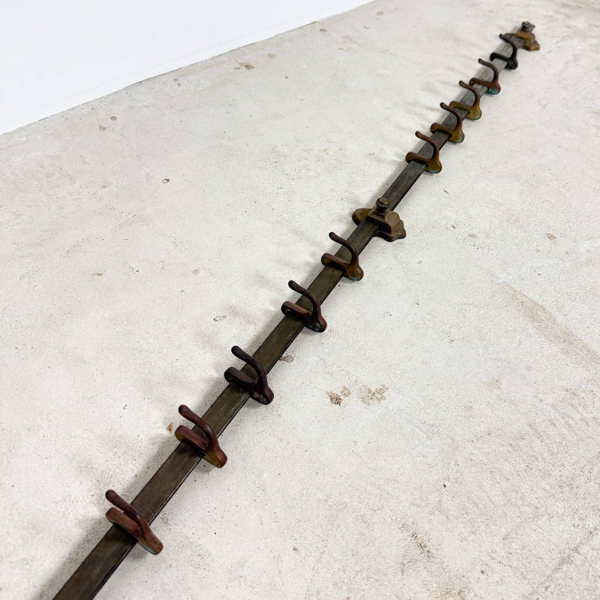 Antique industrial kitchen pot rack in copper with adjustable hooks