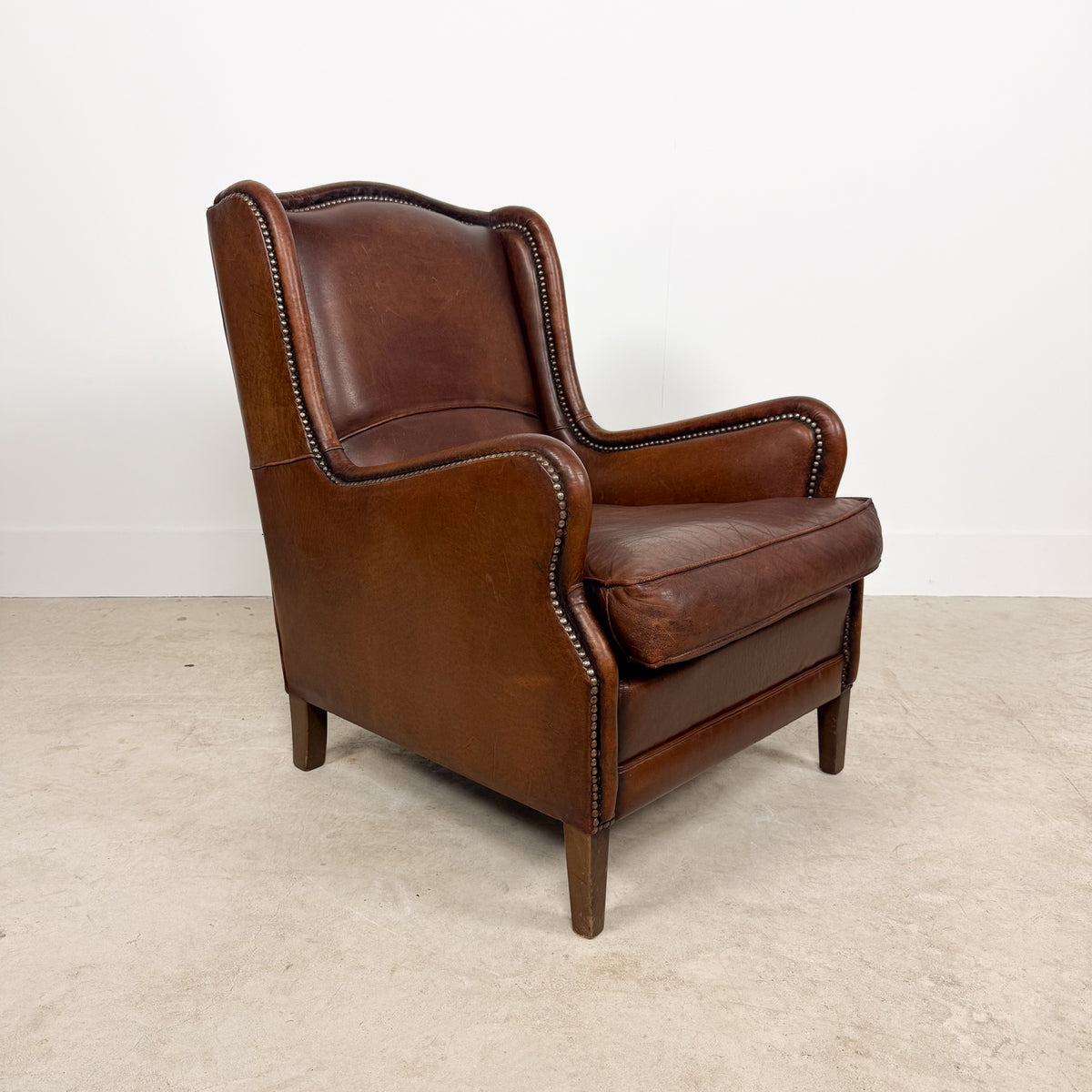 Vintage Brown Sheepskin Leather Wingback Armchair with Nailhead Trim