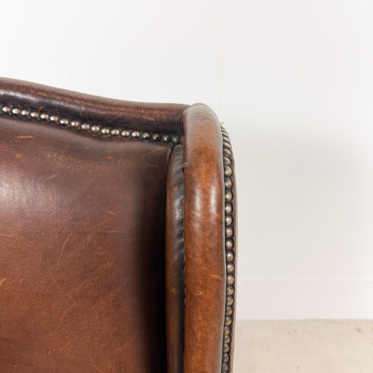 Vintage Brown Sheepskin Leather Wingback Armchair with Nailhead Trim