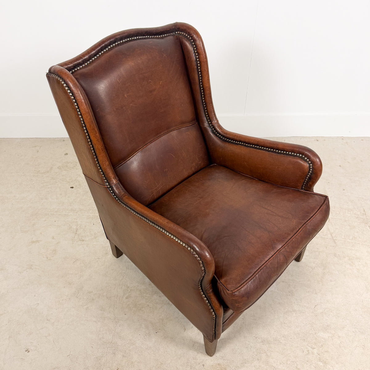 Vintage Brown Sheepskin Leather Wingback Armchair with Nailhead Trim