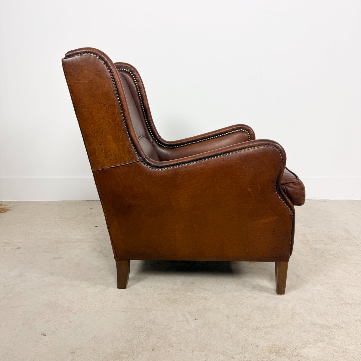 Vintage Brown Sheepskin Leather Wingback Armchair with Nailhead Trim