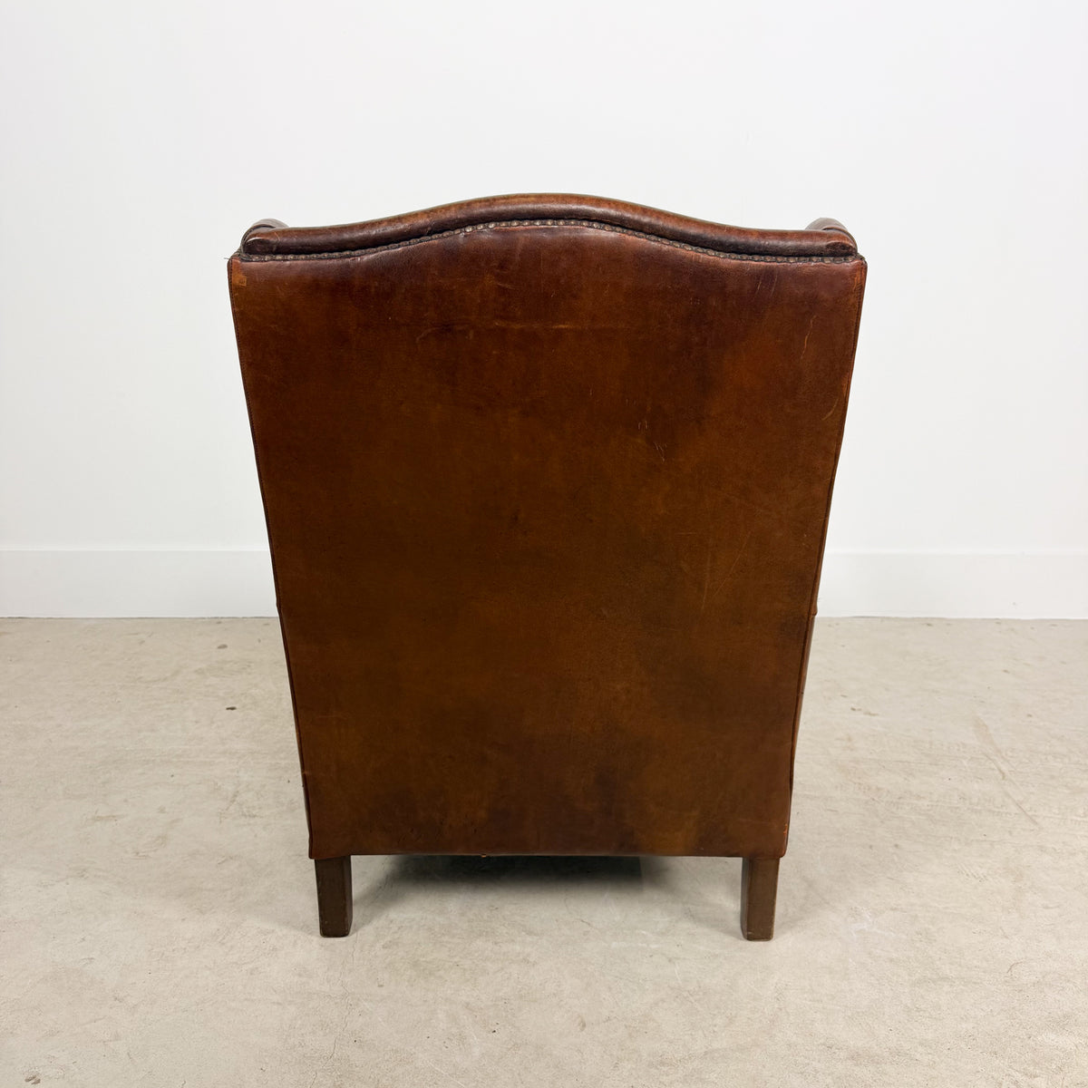 Vintage Brown Sheepskin Leather Wingback Armchair with Nailhead Trim