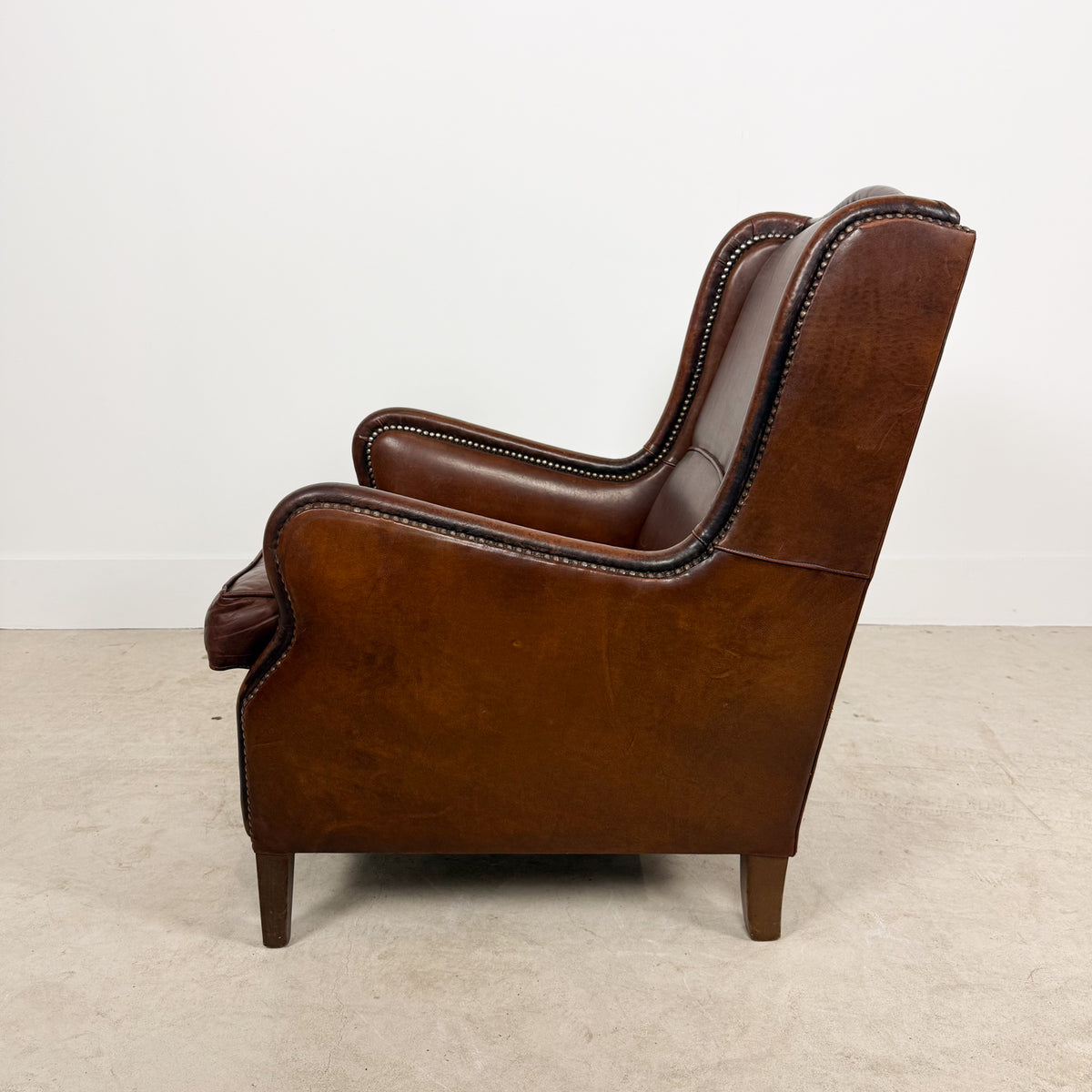 Vintage Brown Sheepskin Leather Wingback Armchair with Nailhead Trim