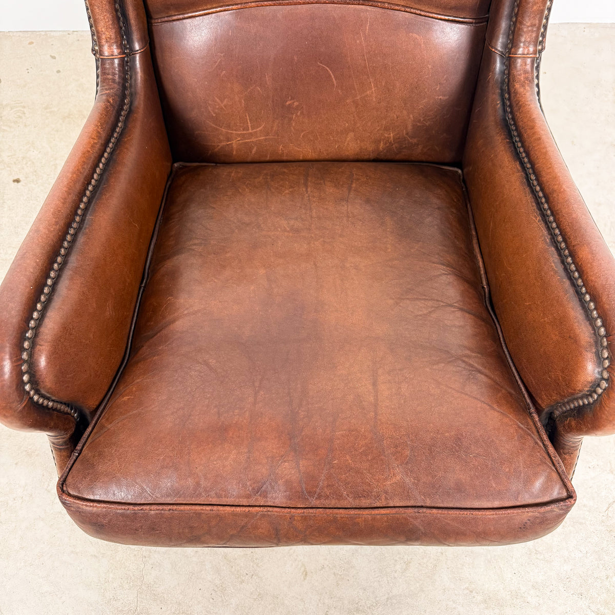 Vintage Brown Sheepskin Leather Wingback Armchair with Nailhead Trim
