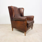 Vintage Brown Leather Wingback Armchair with Aged Patina