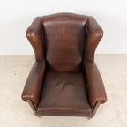 Vintage Brown Leather Wingback Armchair with Aged Patina